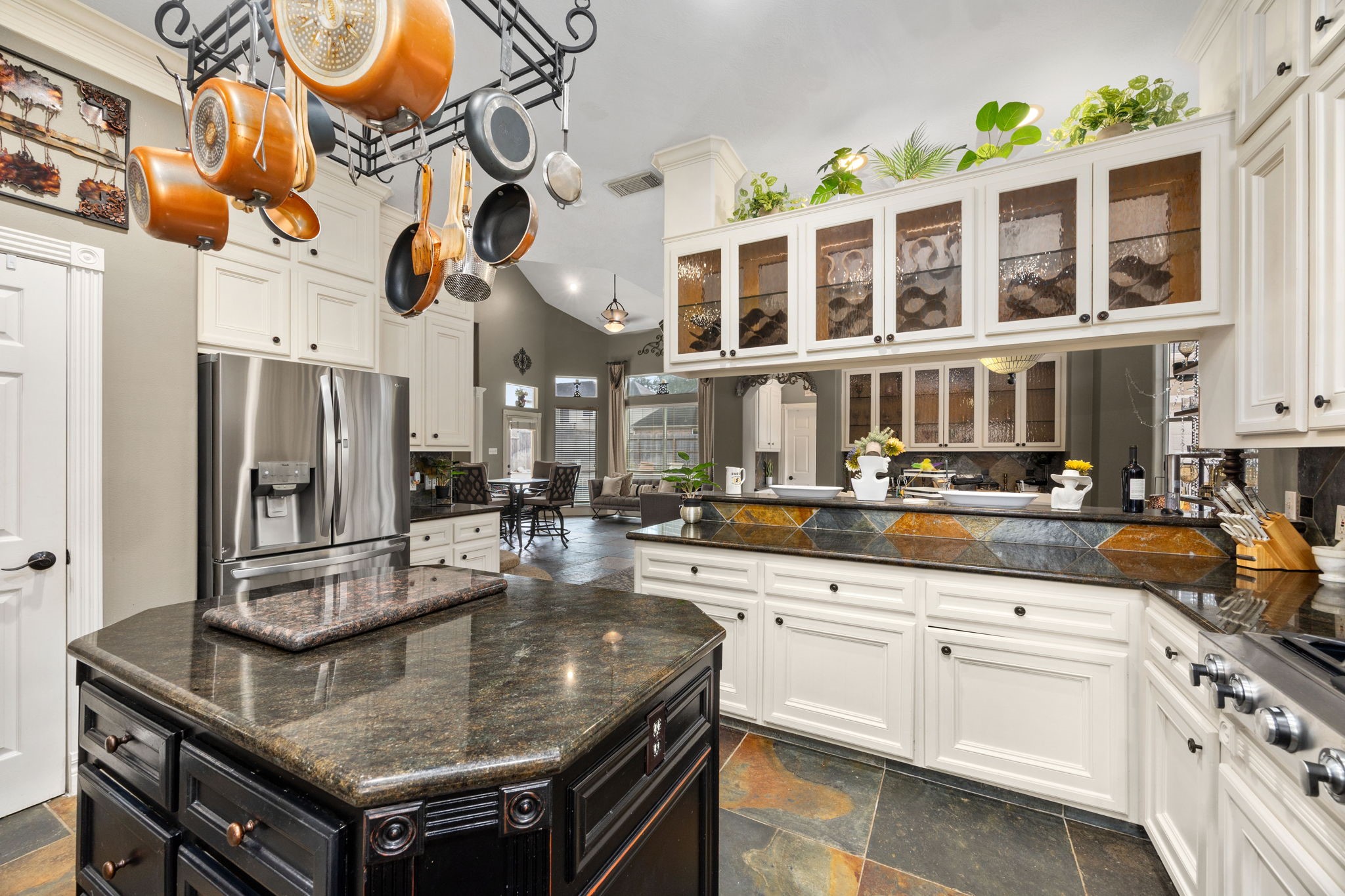 13307 Cypress Pond Road Cypress, TX 77429 - Photo 18 of 50 a kitchen with stainless steel appliances granite countertop a stove and cabinets