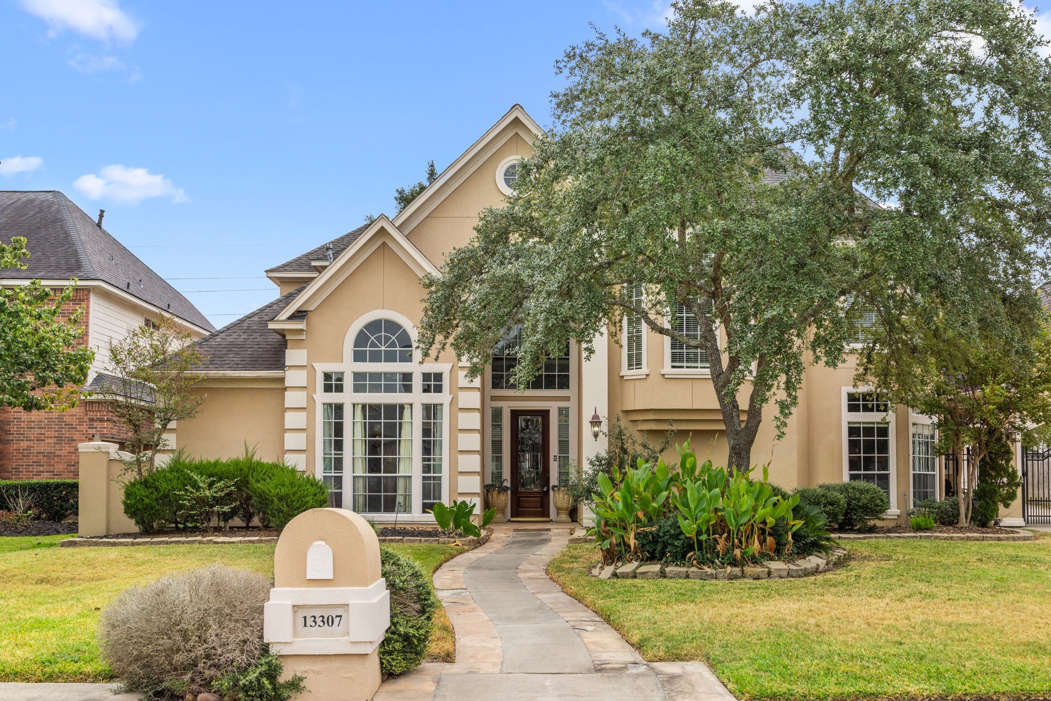 13307 Cypress Pond Road Cypress, TX 77429 - Photo 2 of 50 a front view of a house with garden