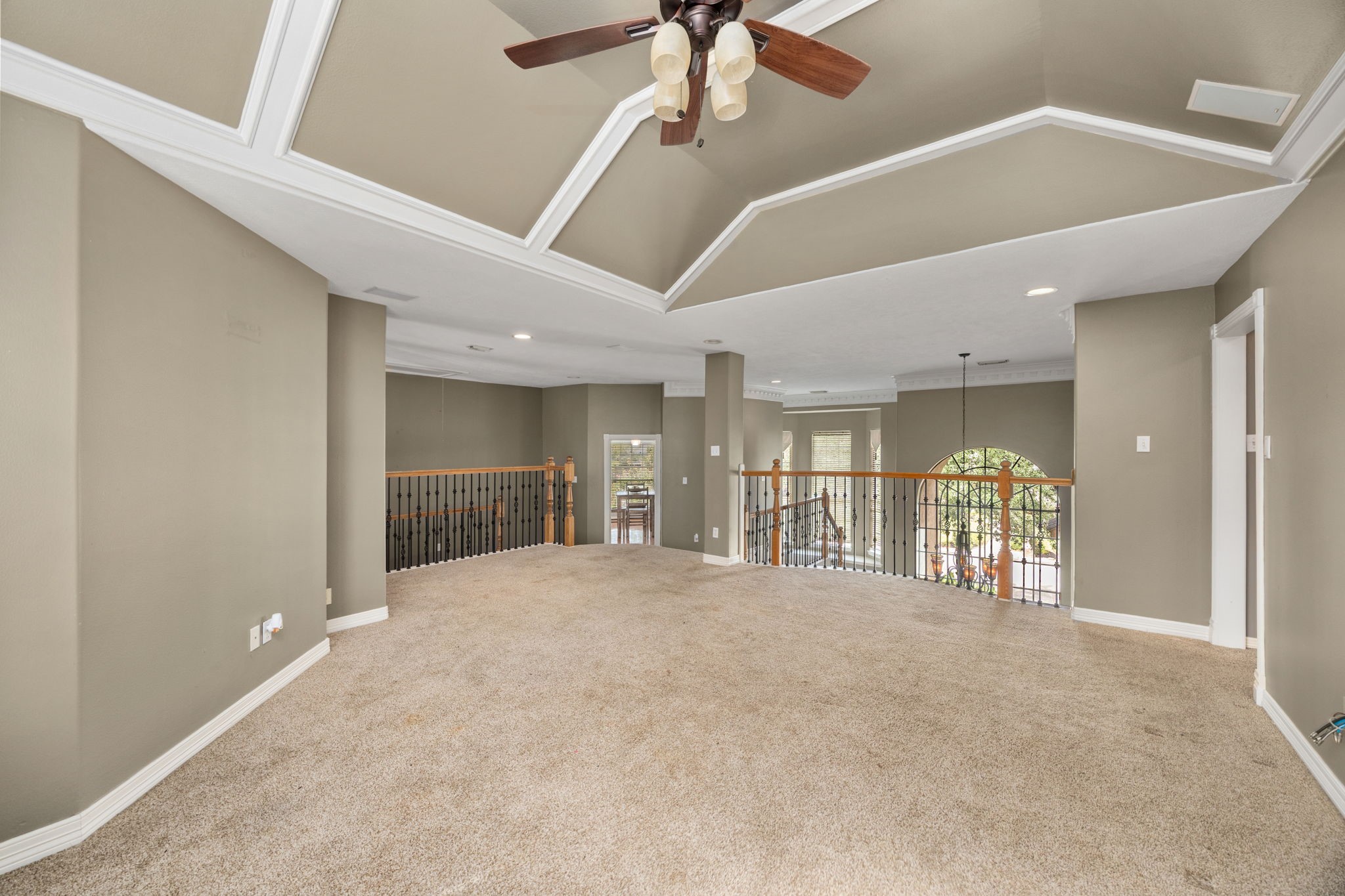13307 Cypress Pond Road Cypress, TX 77429 - Photo 31 of 50 a view of an empty room with window and chandelier fan