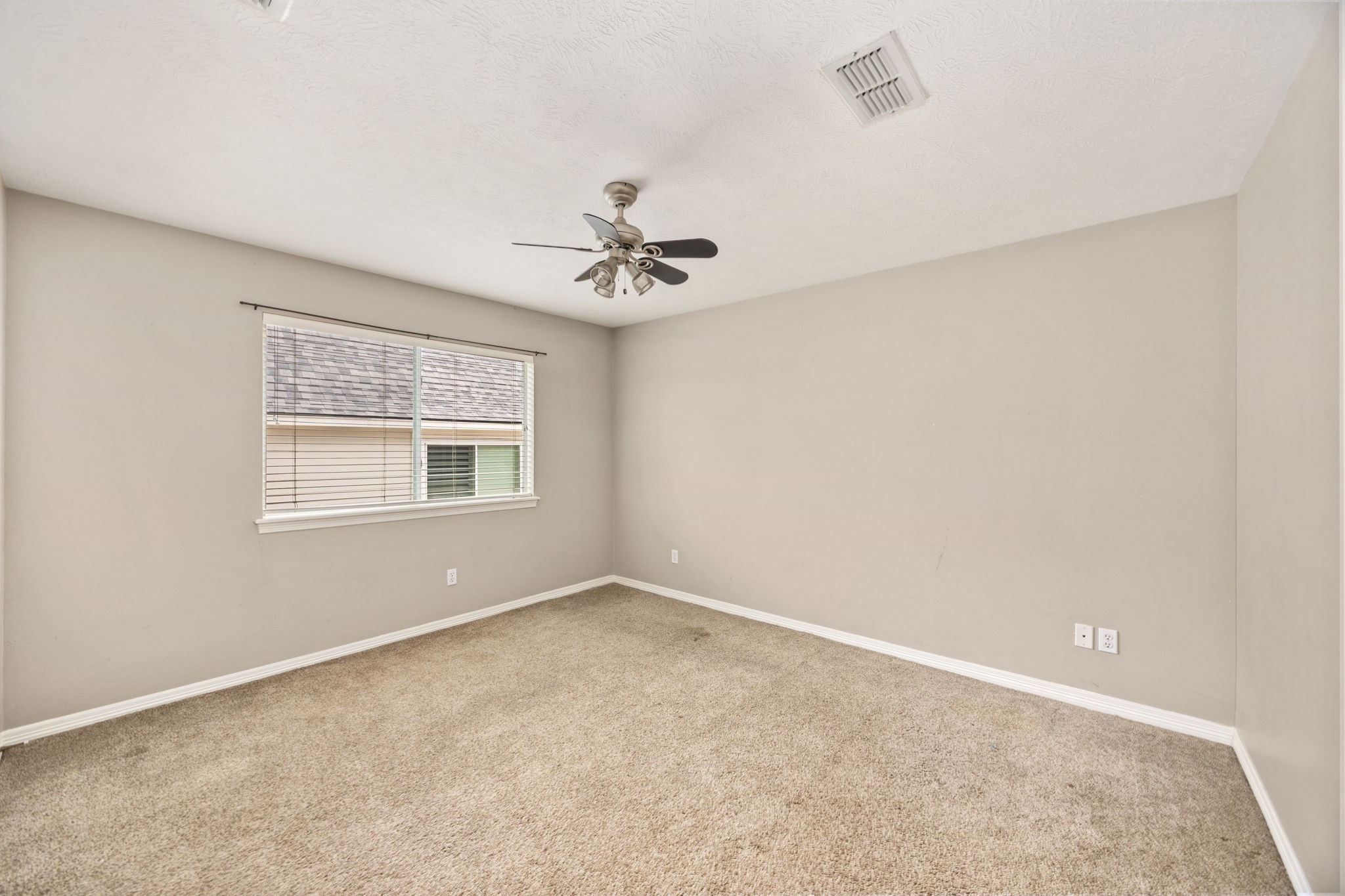 13307 Cypress Pond Road Cypress, TX 77429 - Photo 33 of 50 a view of an empty room with a window