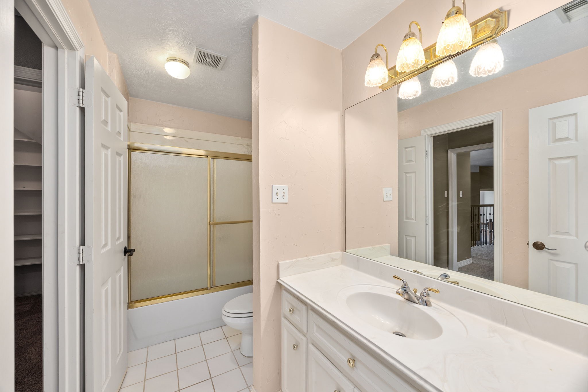 13307 Cypress Pond Road Cypress, TX 77429 - Photo 34 of 50 a bathroom with a sink a toilet and shower