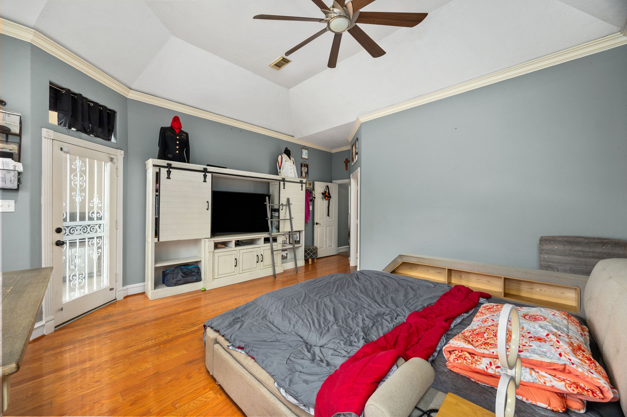 13307 Cypress Pond Road Cypress, TX 77429 - Photo 37 of 50 a bedroom with a bed and a flat screen tv