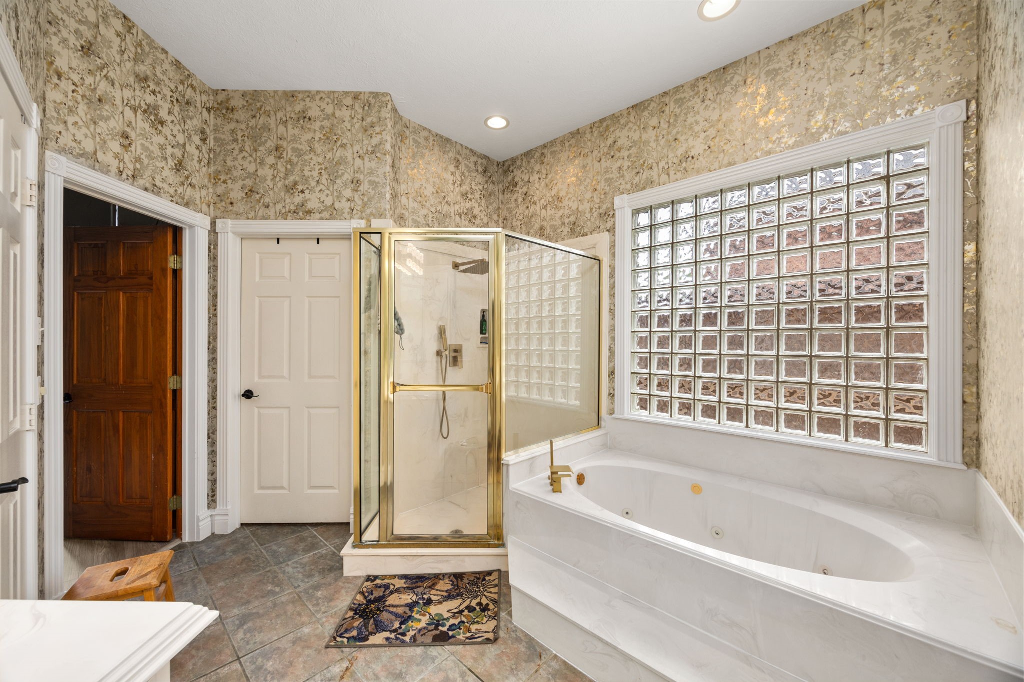 13307 Cypress Pond Road Cypress, TX 77429 - Photo 39 of 50 a bathroom with a bathtub and a shower
