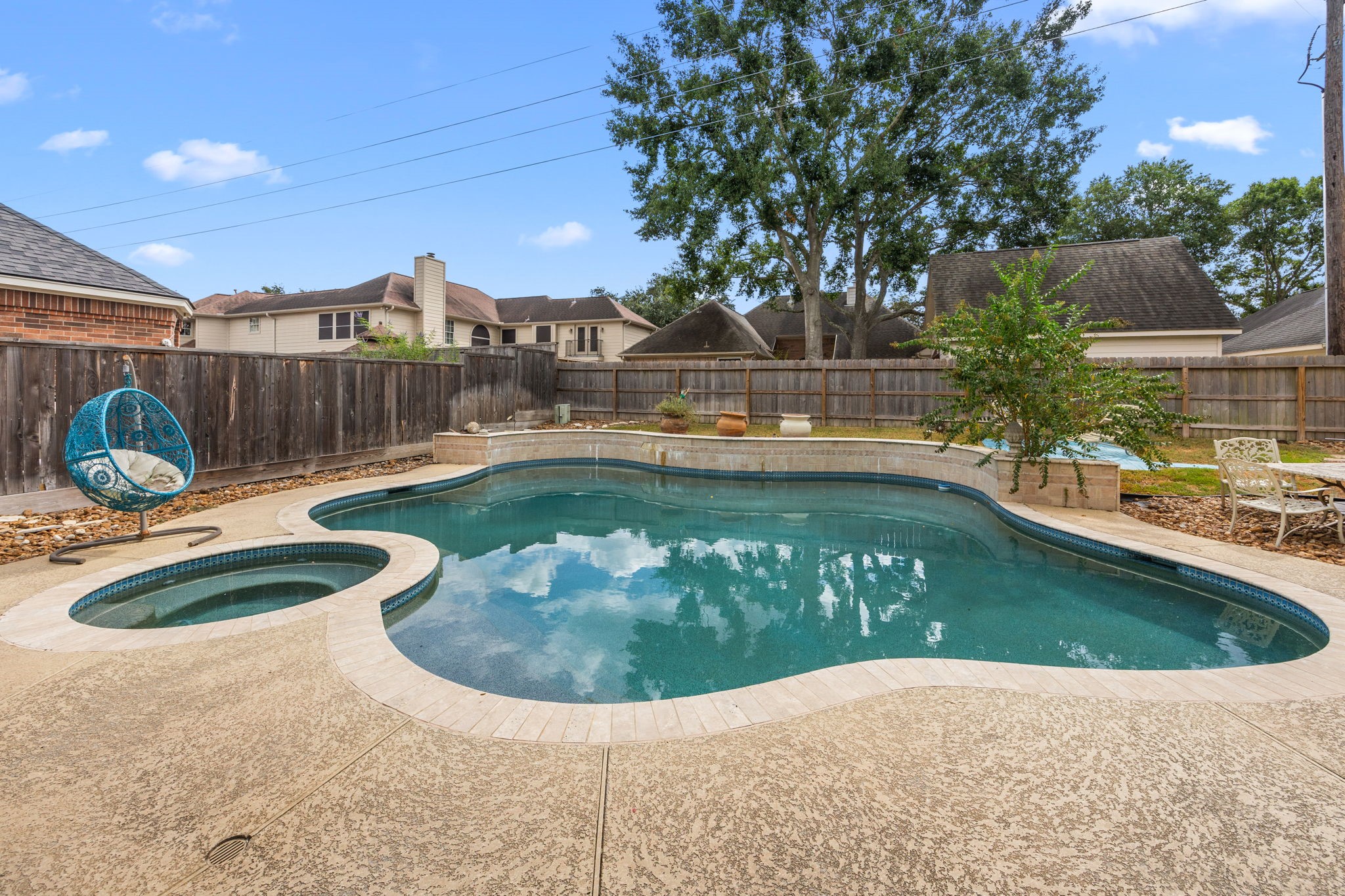 13307 Cypress Pond Road Cypress, TX 77429 - Photo 48 of 50 a view of a swimming pool with a yard