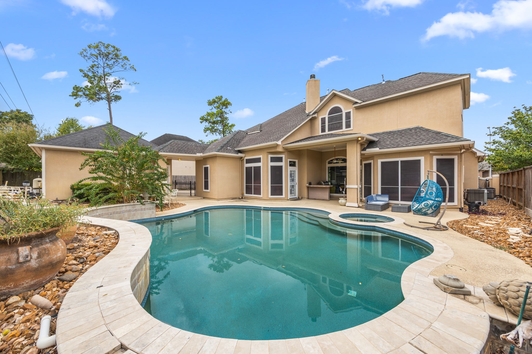 13307 Cypress Pond Road Cypress, TX 77429 - Photo 50 of 50 a view of a house with swimming pool and a porch
