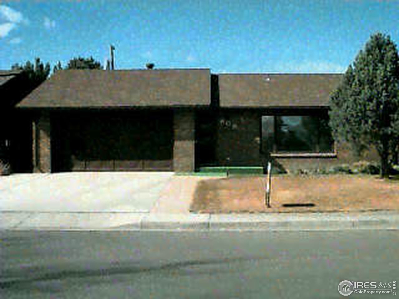809 Lane Fort Fort Morgan, CO 80701 - Photo 1 of 2 a backyard of a house