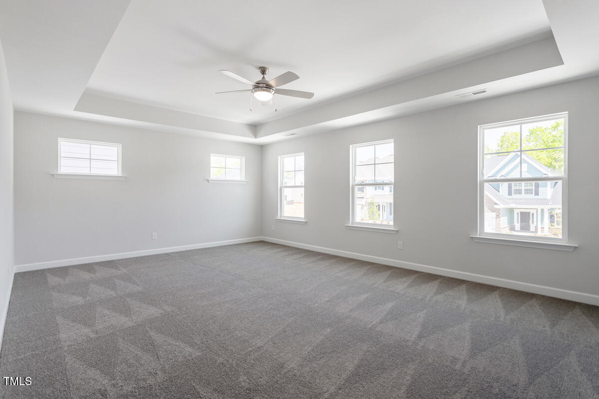 119 Augusta Pond Way, Unit 147 Raleigh, NC 27603 - Photo 13 of 37 a view of an empty room with a window