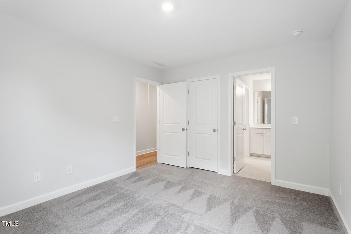 119 Augusta Pond Way, Unit 147 Raleigh, NC 27603 - Photo 27 of 37 a view of an empty room