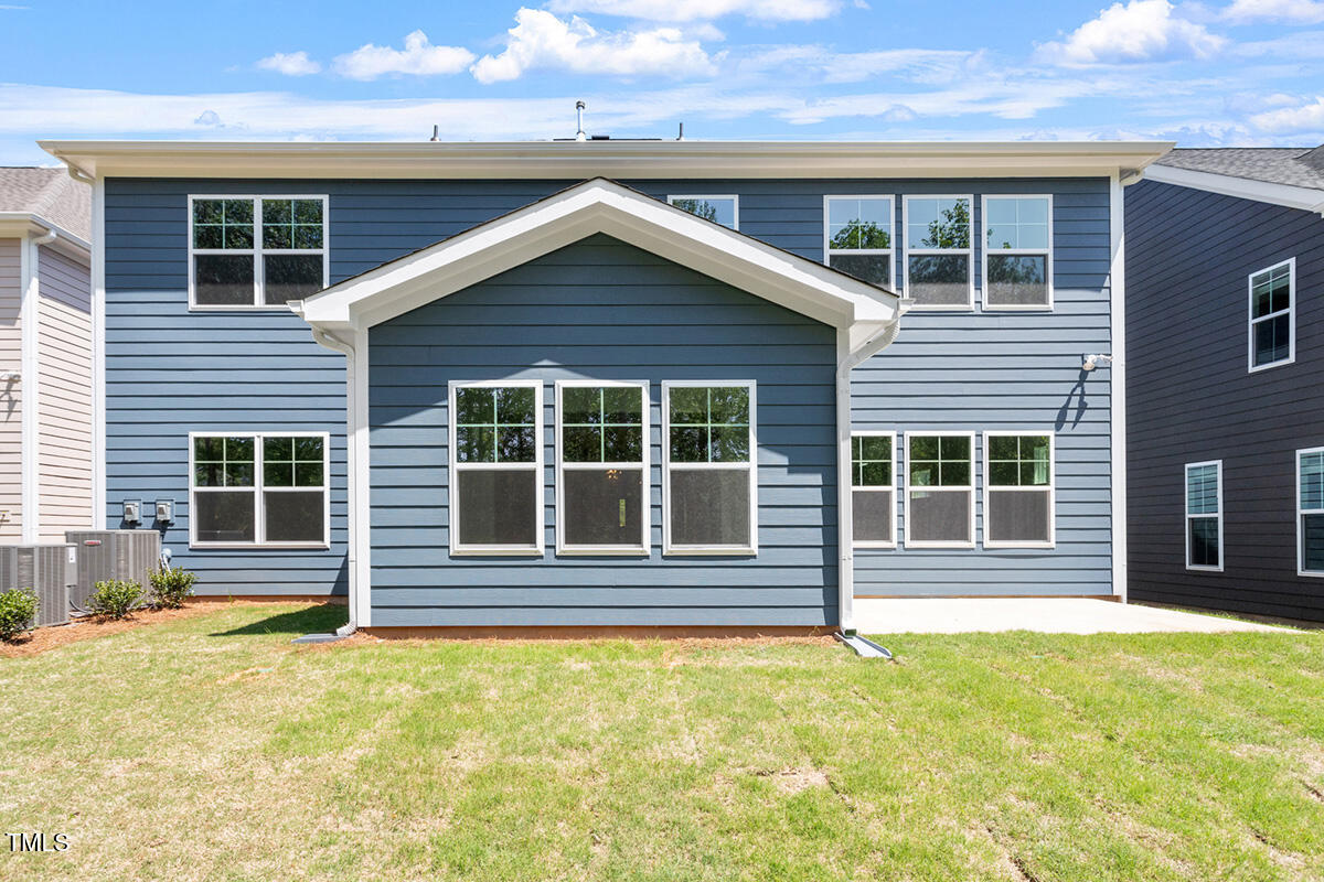 119 Augusta Pond Way, Unit 147 Raleigh, NC 27603 - Photo 33 of 37 a house view with a outdoor space