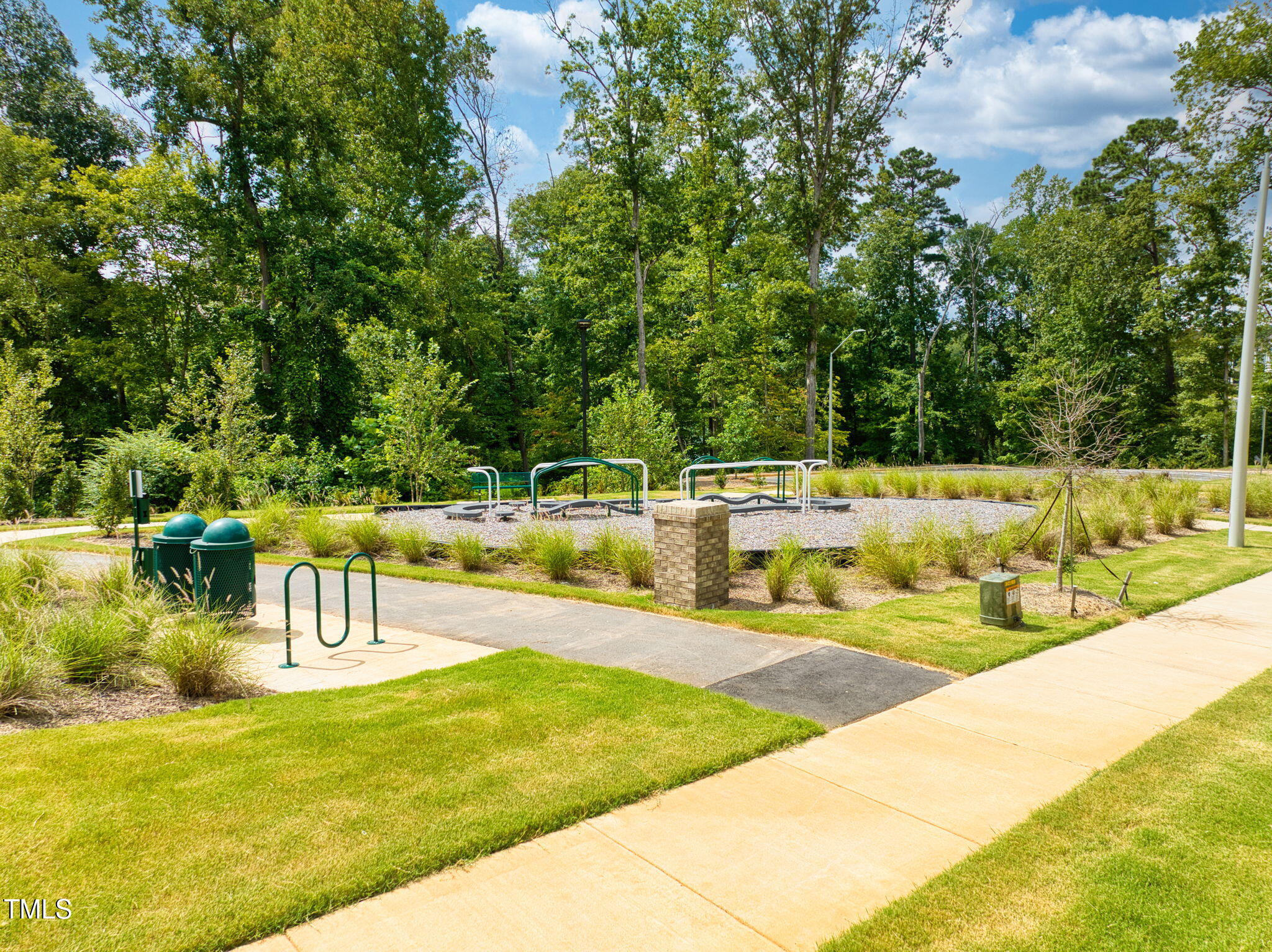 119 Augusta Pond Way, Unit 147 Raleigh, NC 27603 - Photo 34 of 37 a view of a swimming pool with a patio and a yard