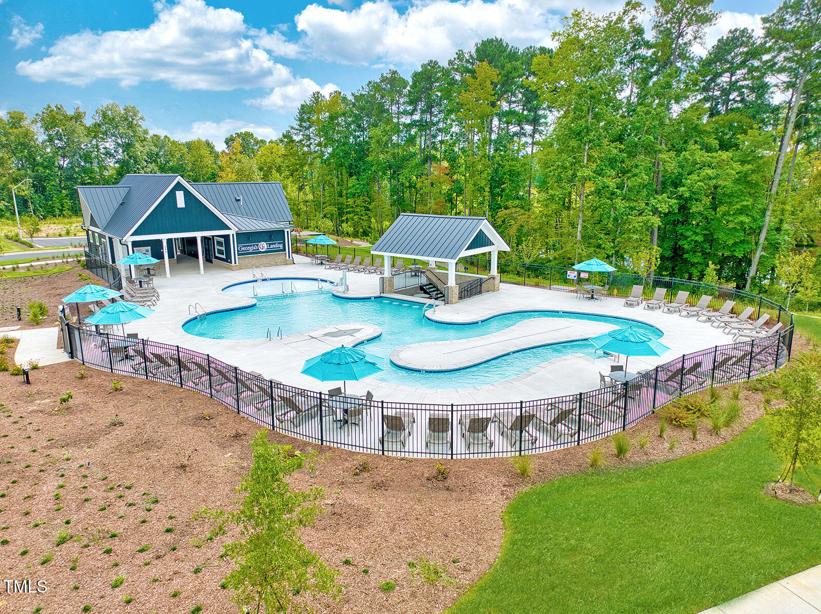 119 Augusta Pond Way, Unit 147 Raleigh, NC 27603 - Photo 37 of 37 a view of a house with pool and chairs