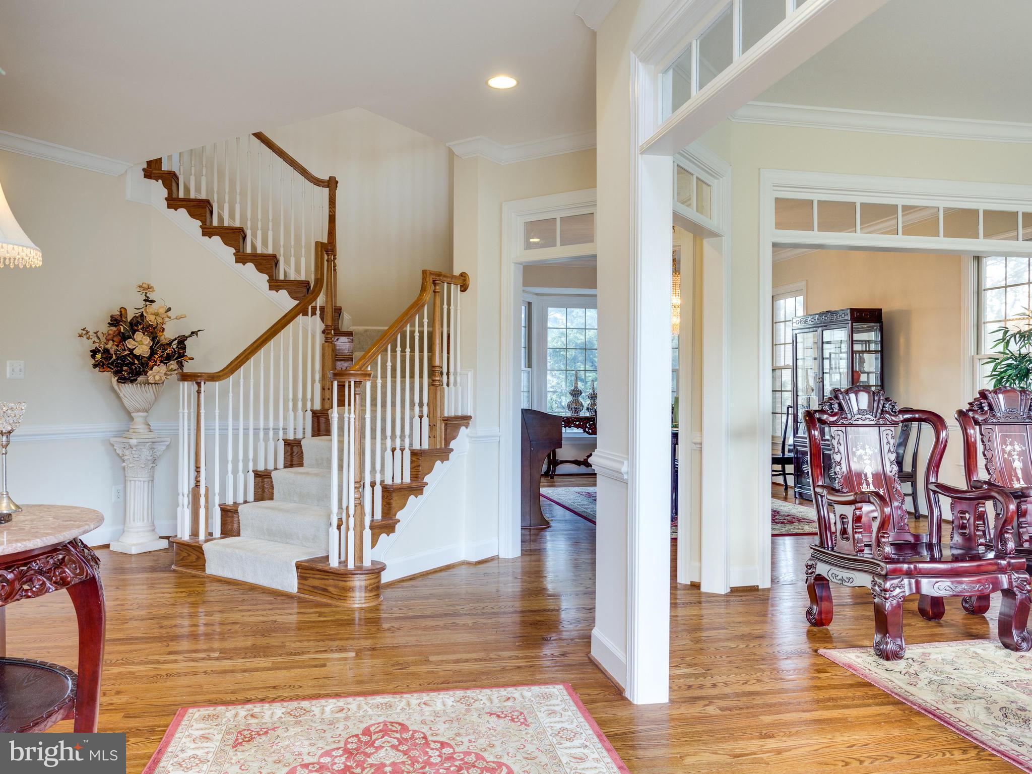 1406 Stanbridge Place Vienna, VA 22182 - Photo 4 of 30 a view of entryway and hall with wooden floor