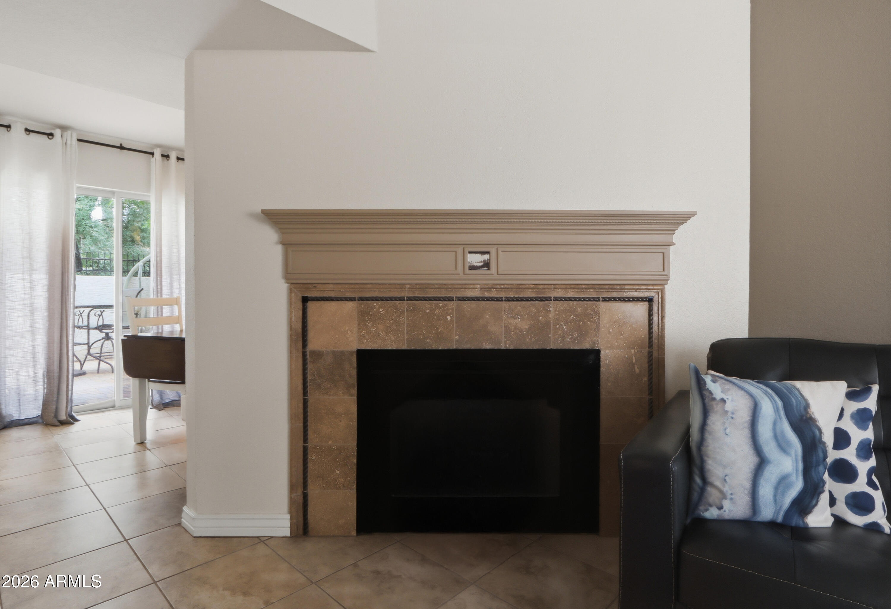 1402 East Osborn Road, Unit 2 Phoenix, AZ 85014 - Photo 4 of 29 a living room with furniture and a fireplace