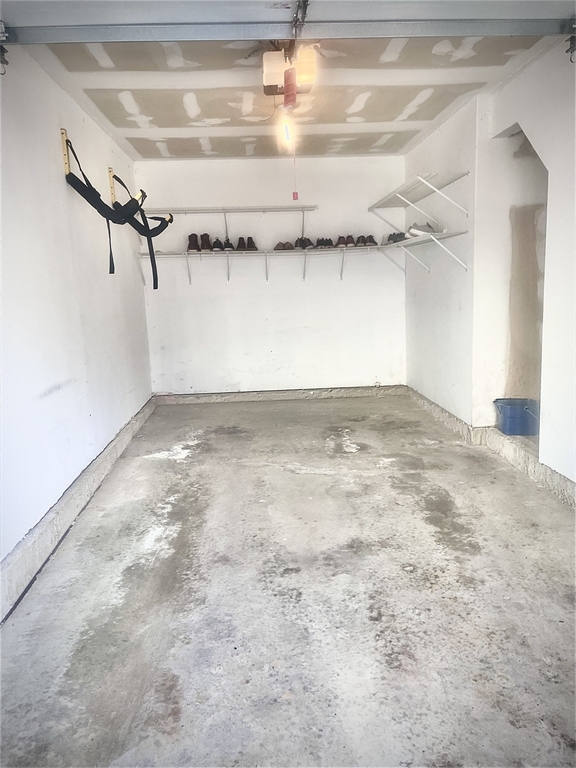 208 Gazebo Circle, Unit 208 Reading, MA 01867 - Photo 10 of 10 a view of a room with rack on the wall