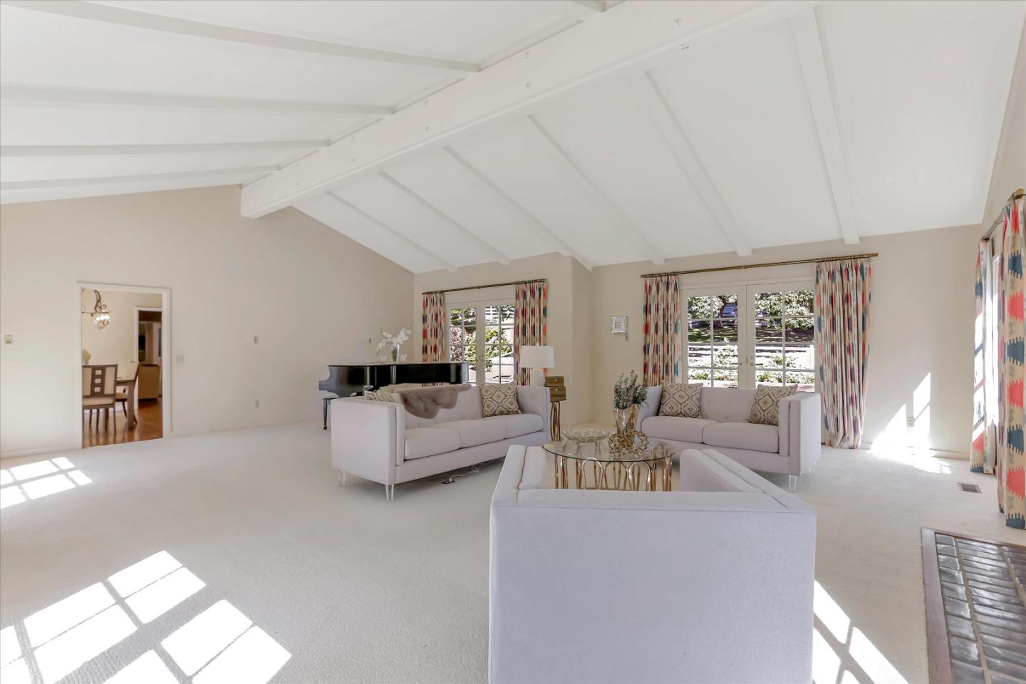 22 La Rancheria Carmel Valley, CA 93924 - Photo 14 of 44 a living room with furniture and a large window