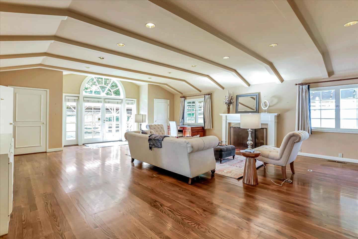 22 La Rancheria Carmel Valley, CA 93924 - Photo 17 of 44 a living room with fireplace furniture and a large window