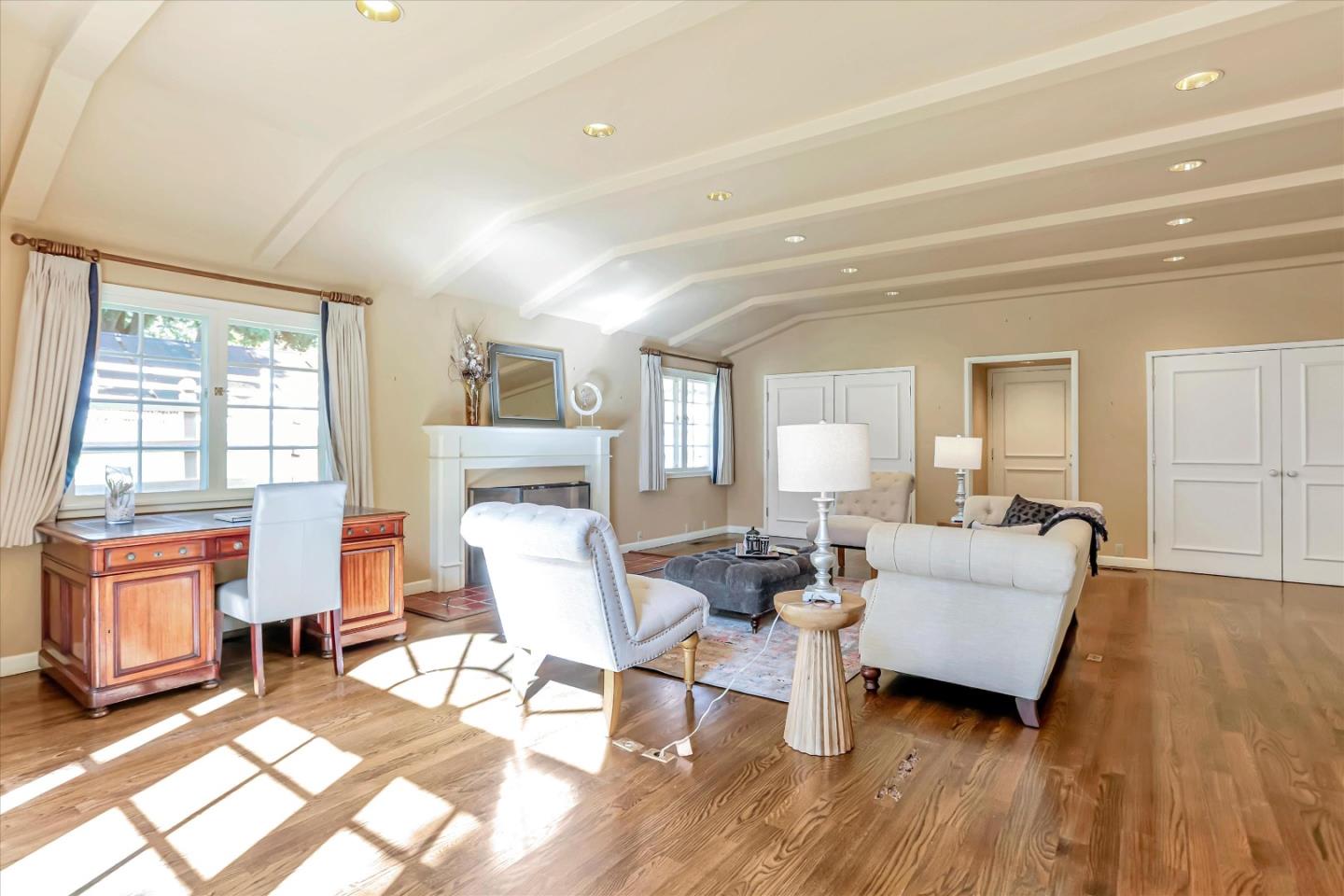 22 La Rancheria Carmel Valley, CA 93924 - Photo 19 of 44 a living room with furniture and a wooden floor