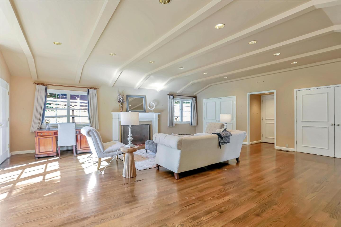 22 La Rancheria Carmel Valley, CA 93924 - Photo 20 of 44 a living room with furniture and a wooden floor