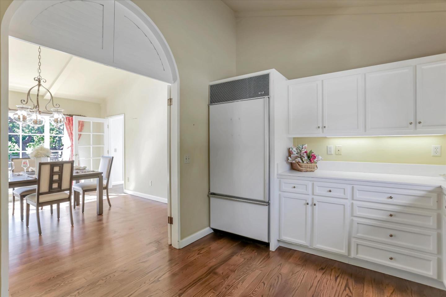 22 La Rancheria Carmel Valley, CA 93924 - Photo 23 of 44 a kitchen with granite countertop cabinets and wooden floor