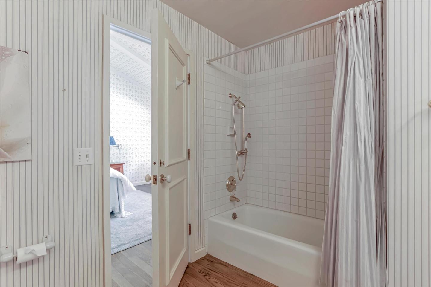 22 La Rancheria Carmel Valley, CA 93924 - Photo 33 of 44 a bathroom with a bathtub shower and a sink