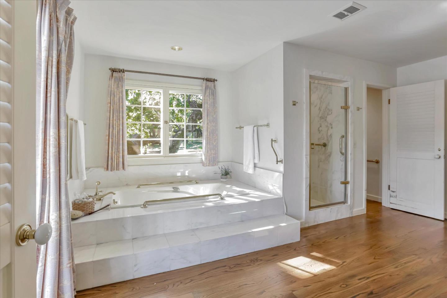 22 La Rancheria Carmel Valley, CA 93924 - Photo 35 of 44 a bathroom with a tub shower and sink