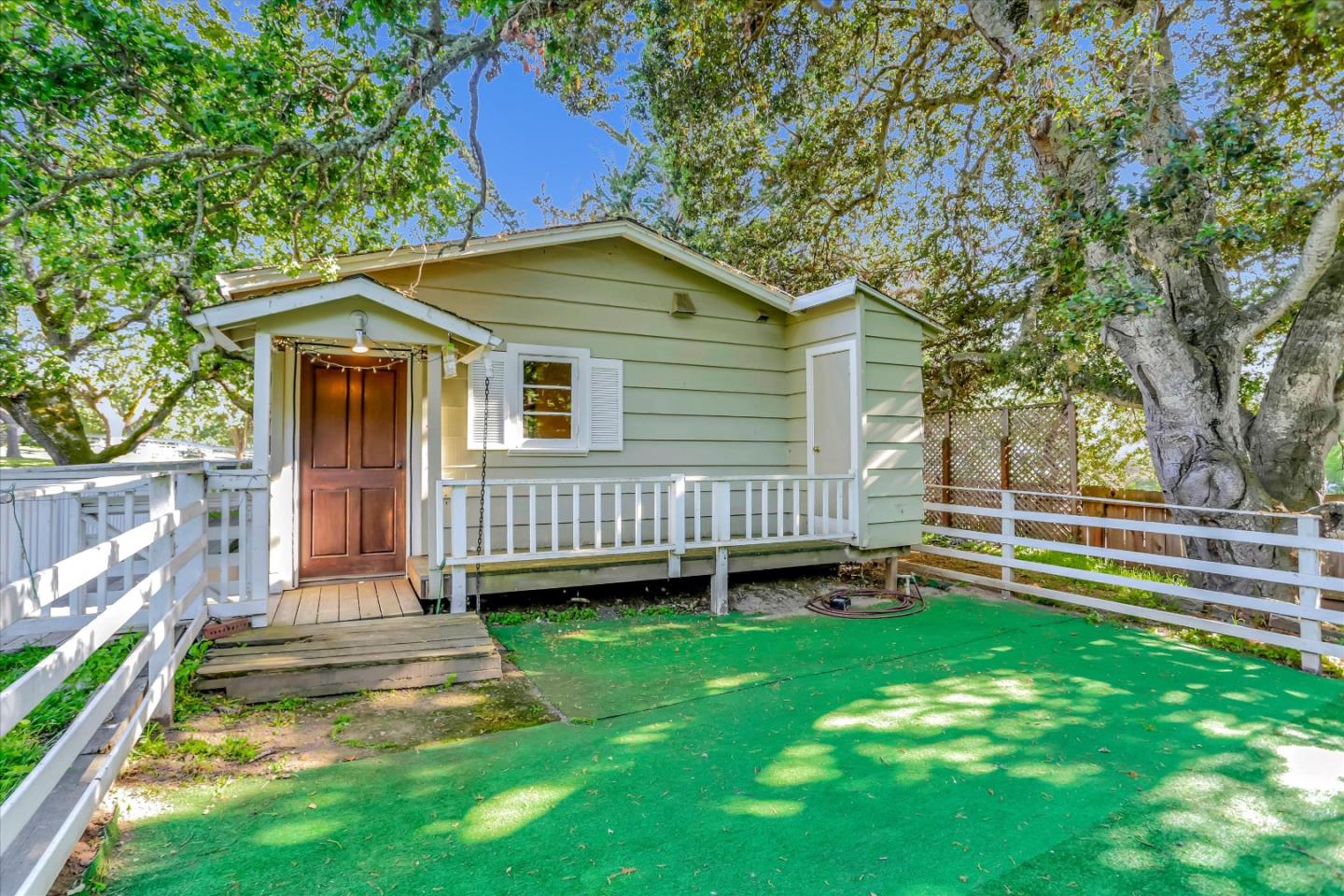 22 La Rancheria Carmel Valley, CA 93924 - Photo 39 of 44 a view of a house with a backyard and a deck