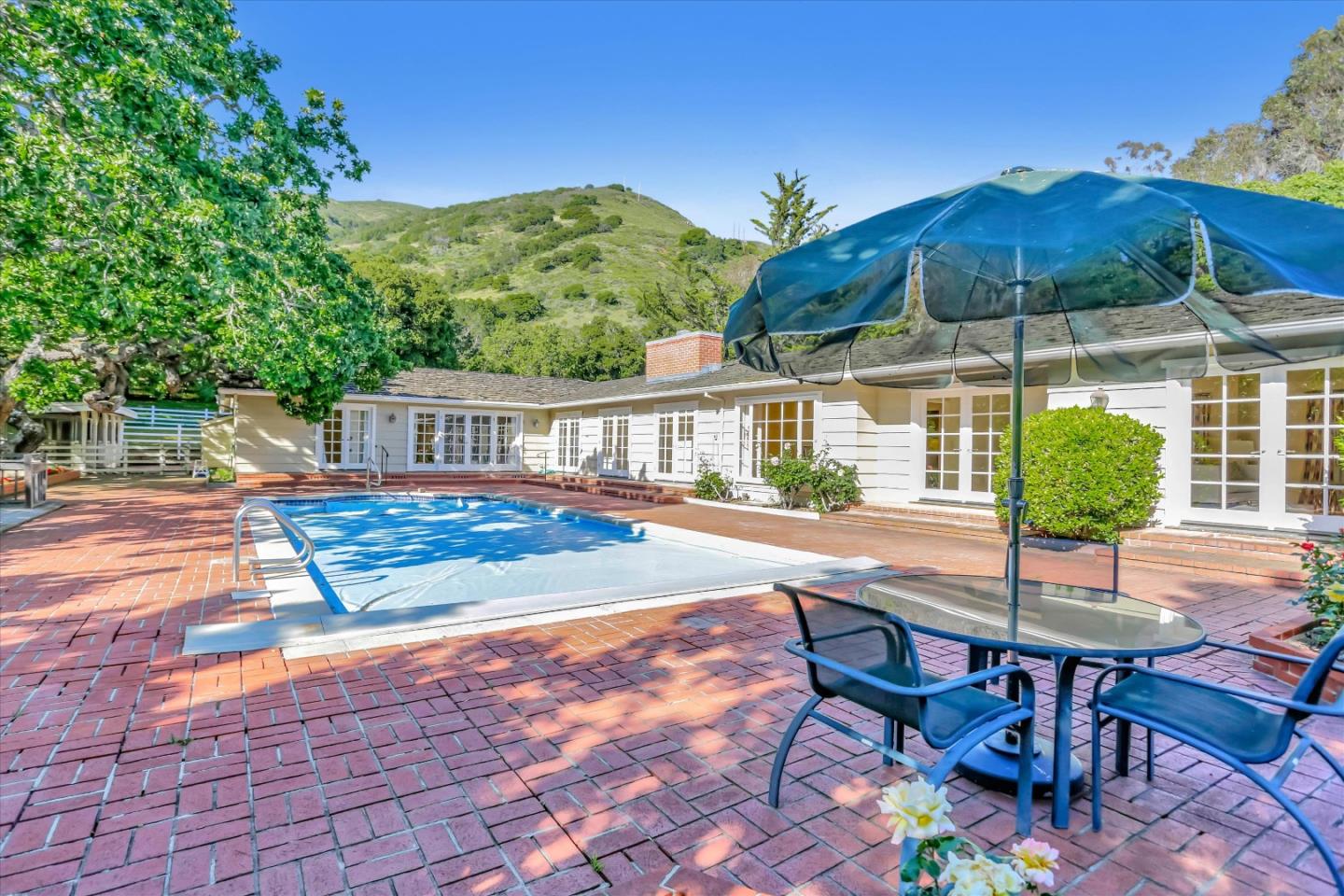 22 La Rancheria Carmel Valley, CA 93924 - Photo 40 of 44 a view of a swimming pool with a patio