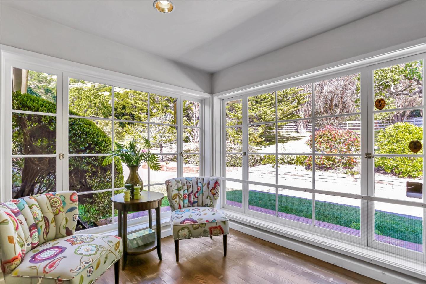 22 La Rancheria Carmel Valley, CA 93924 - Photo 7 of 44 a living room with furniture and a floor to ceiling window
