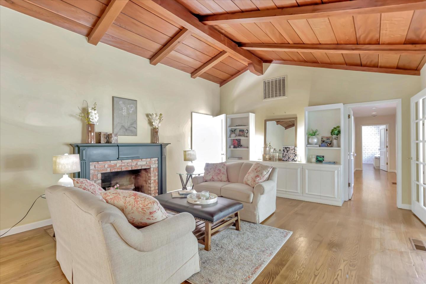 22 La Rancheria Carmel Valley, CA 93924 - Photo 9 of 44 a living room with furniture and a fireplace