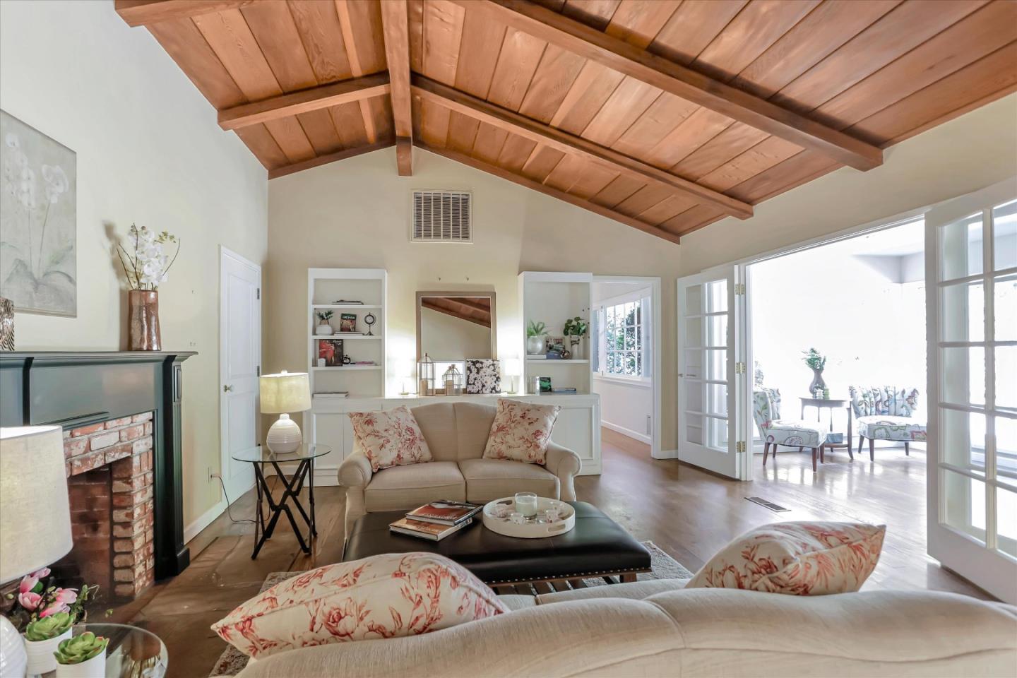 22 La Rancheria Carmel Valley, CA 93924 - Photo 10 of 44 a living room with furniture and a fireplace