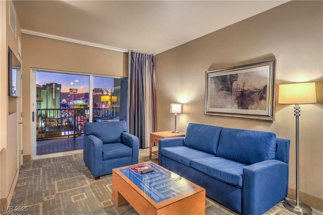 211 East Flamingo Road, Unit 1503 Las Vegas, NV 89169 - Photo 10 of 44 Living room with carpet
