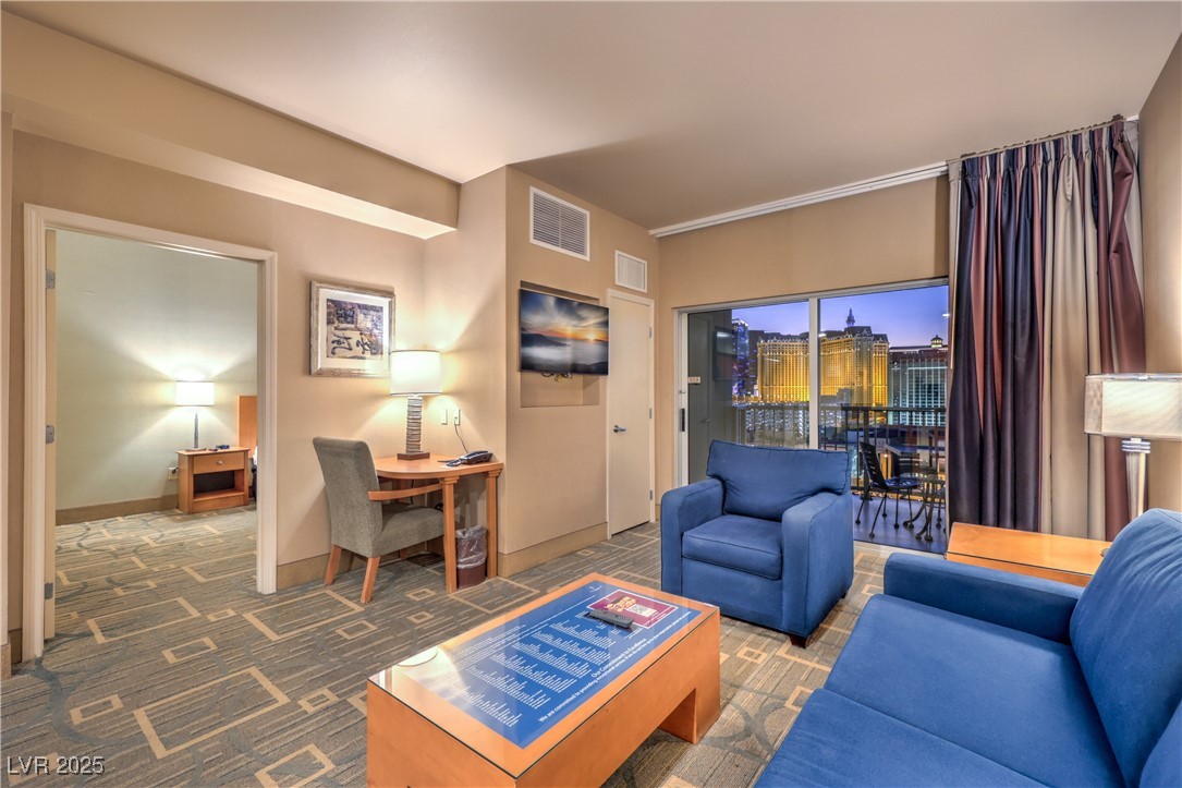 211 East Flamingo Road, Unit 1503 Las Vegas, NV 89169 - Photo 11 of 44 View of carpeted living area