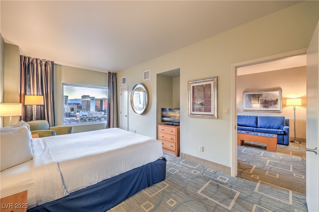 211 East Flamingo Road, Unit 1503 Las Vegas, NV 89169 - Photo 20 of 44 Bedroom with carpet floors