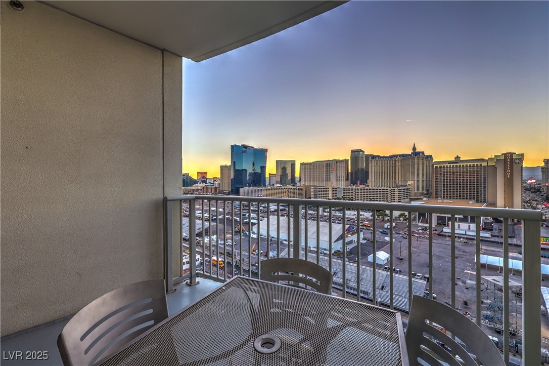 211 East Flamingo Road, Unit 1503 Las Vegas, NV 89169 - Photo 31 of 44 Balcony at dusk with a view of skyline
