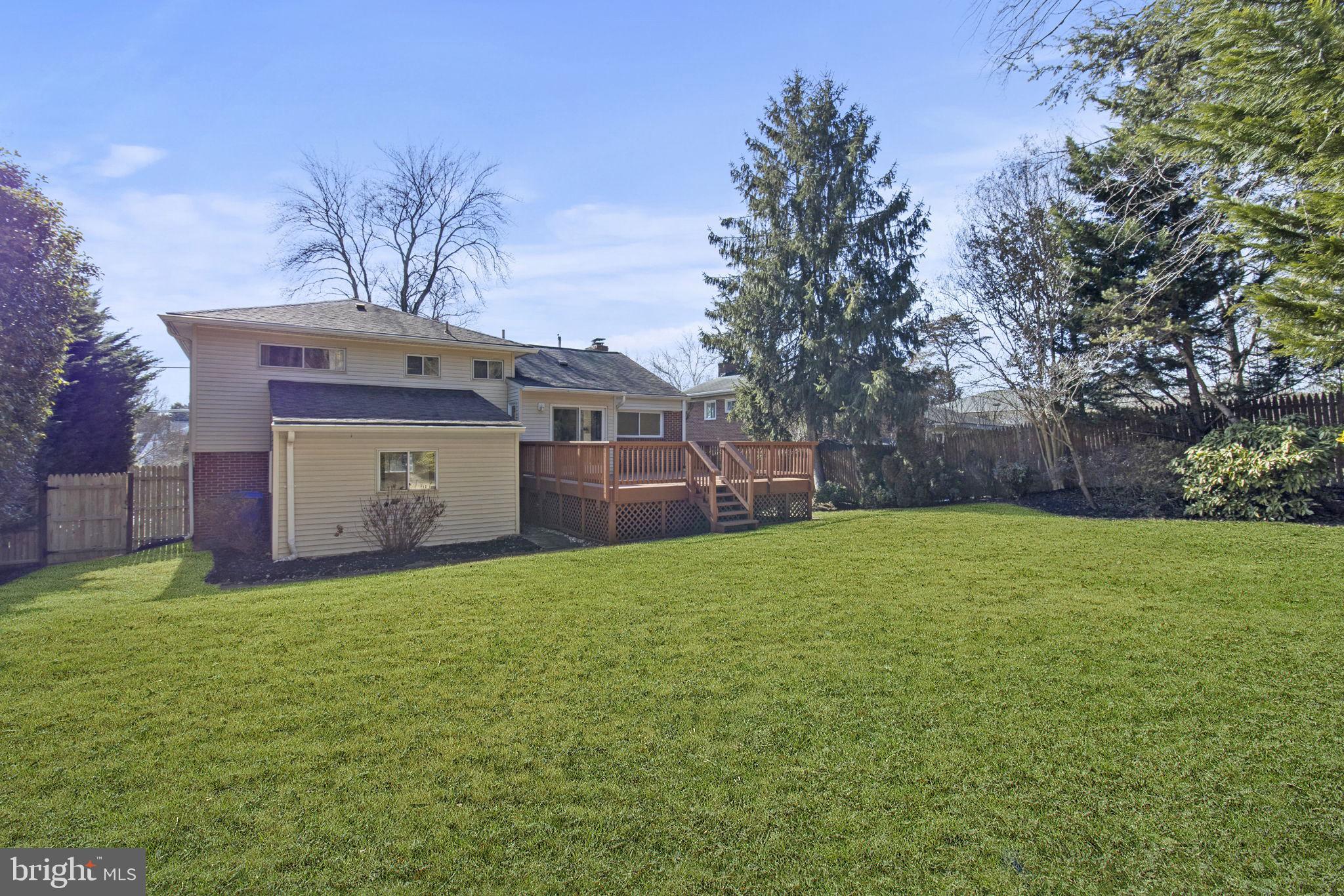 9703 Singleton Drive Bethesda, MD 20817 - Photo 8 of 22 a house view with a garden space