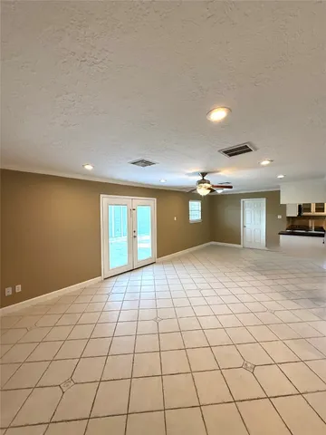 a view of an empty room and window