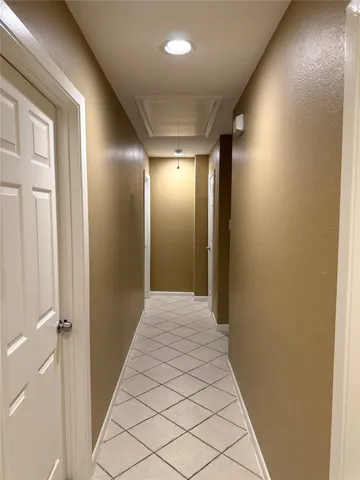 a view of hallway with an entryway