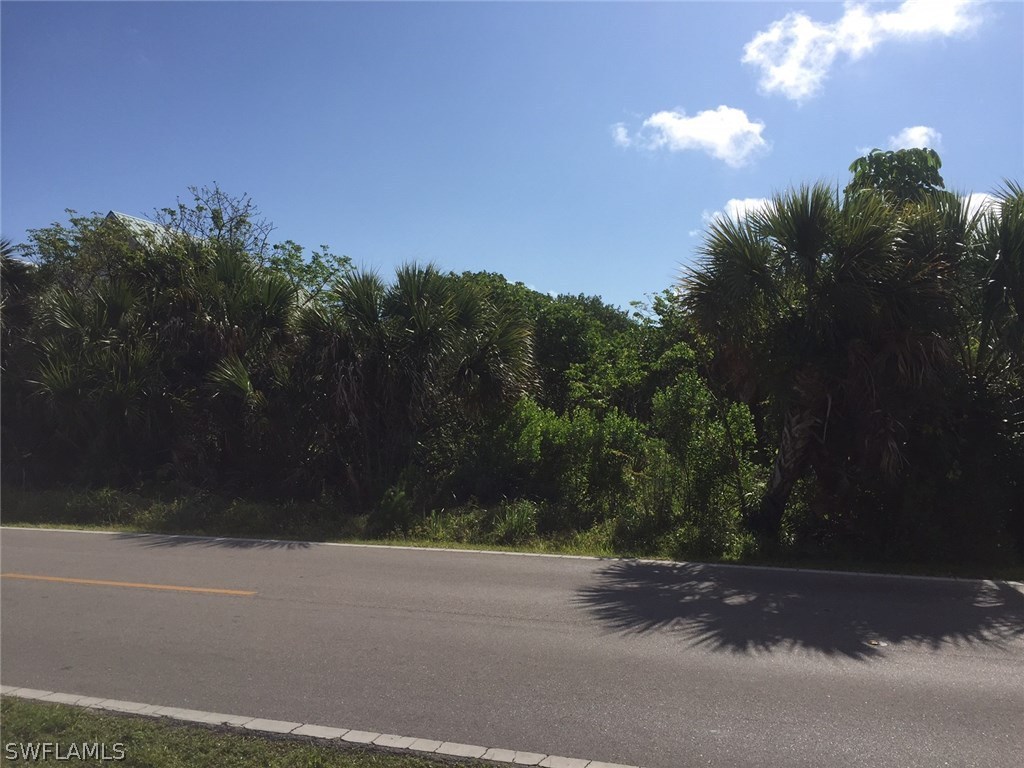 878 Rabbit Road Sanibel, FL 33957 - Photo 1 of 5 a view of a yard