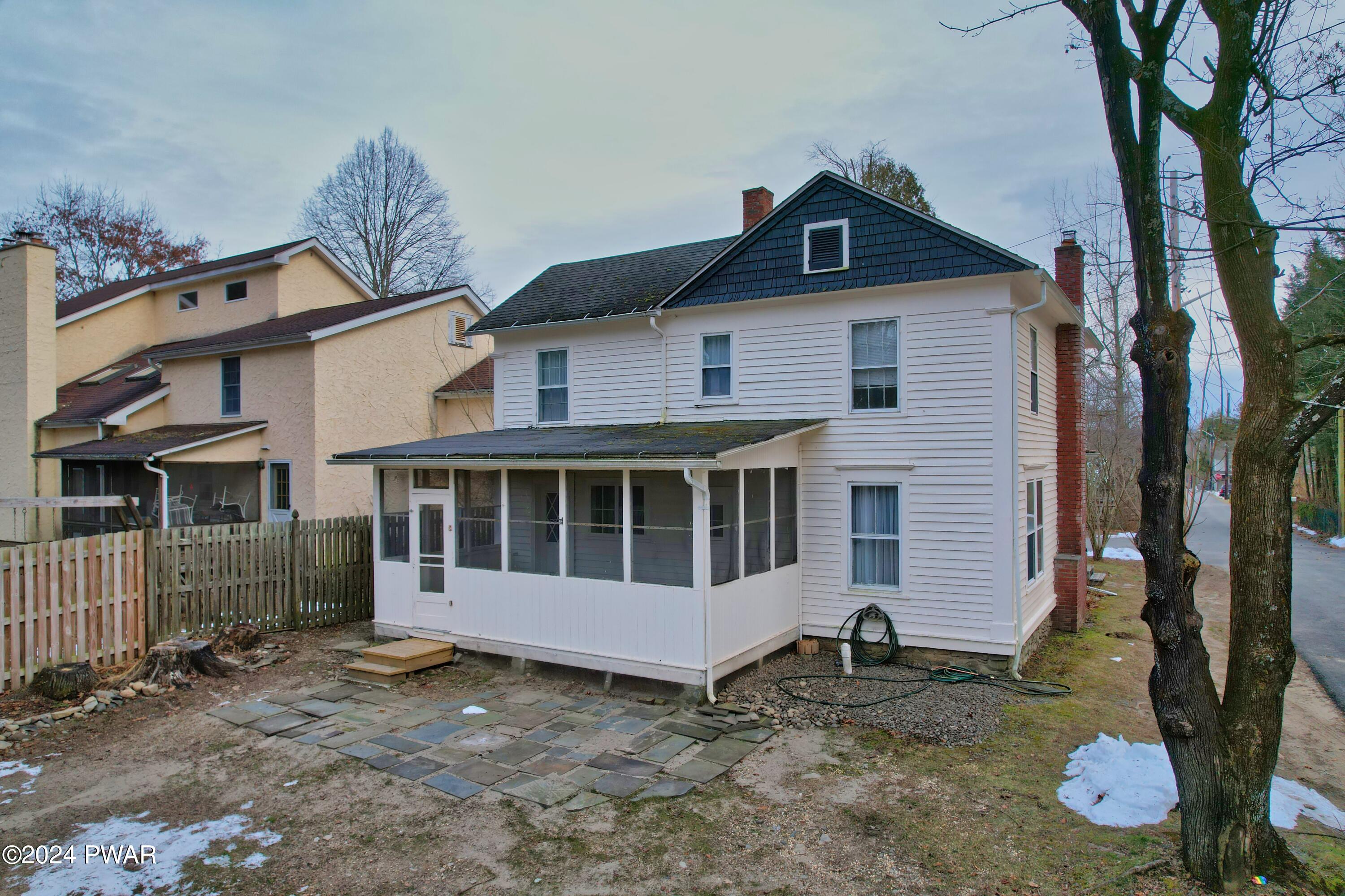 108 9th Street Milford, PA 18337 - Photo 23 of 38 a front view of a house with a yard