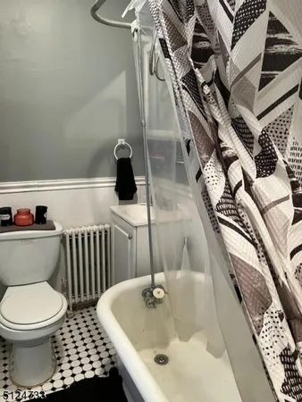 a bathroom with a sink and a toilet