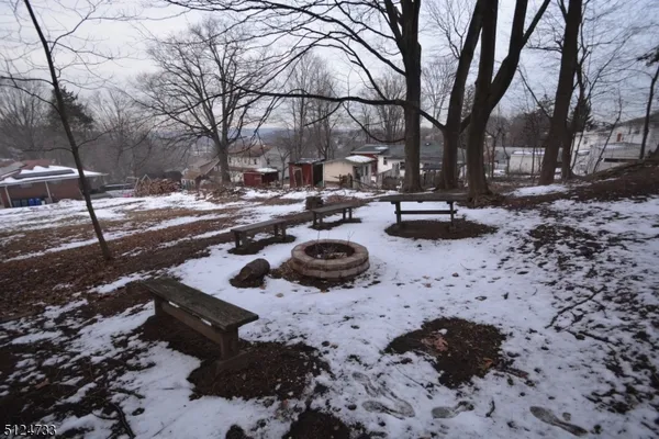 a view of a yard with trees
