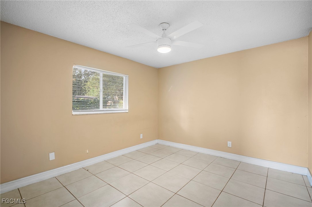 5539 Tenth Avenue Fort Myers, FL 33907 - Photo 12 of 20 a view of an empty room with a window