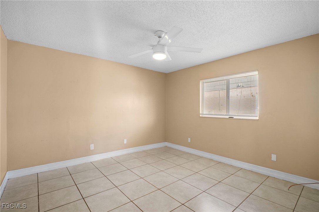5539 Tenth Avenue Fort Myers, FL 33907 - Photo 14 of 20 a view of an empty room with a window
