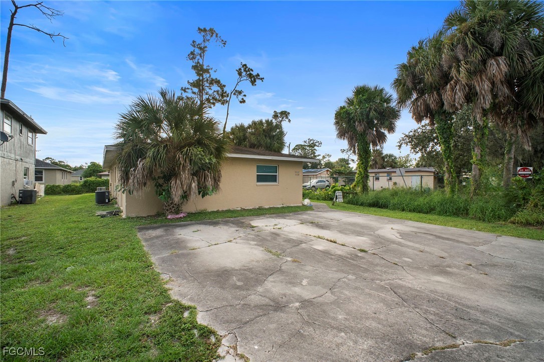 5539 Tenth Avenue Fort Myers, FL 33907 - Photo 20 of 20 a view of a house with a yard