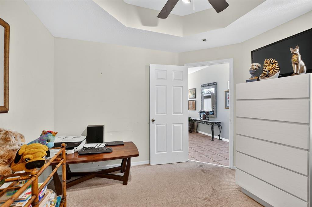 12614 Tiboli Chase Court, Unit 1 Boca Raton, FL 33496 - Photo 24 of 62 a living room with furniture and a table