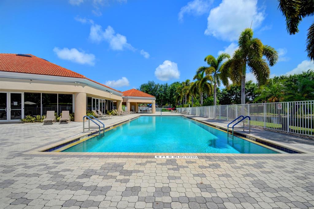 12614 Tiboli Chase Court, Unit 1 Boca Raton, FL 33496 - Photo 52 of 62 a view of a house with swimming pool