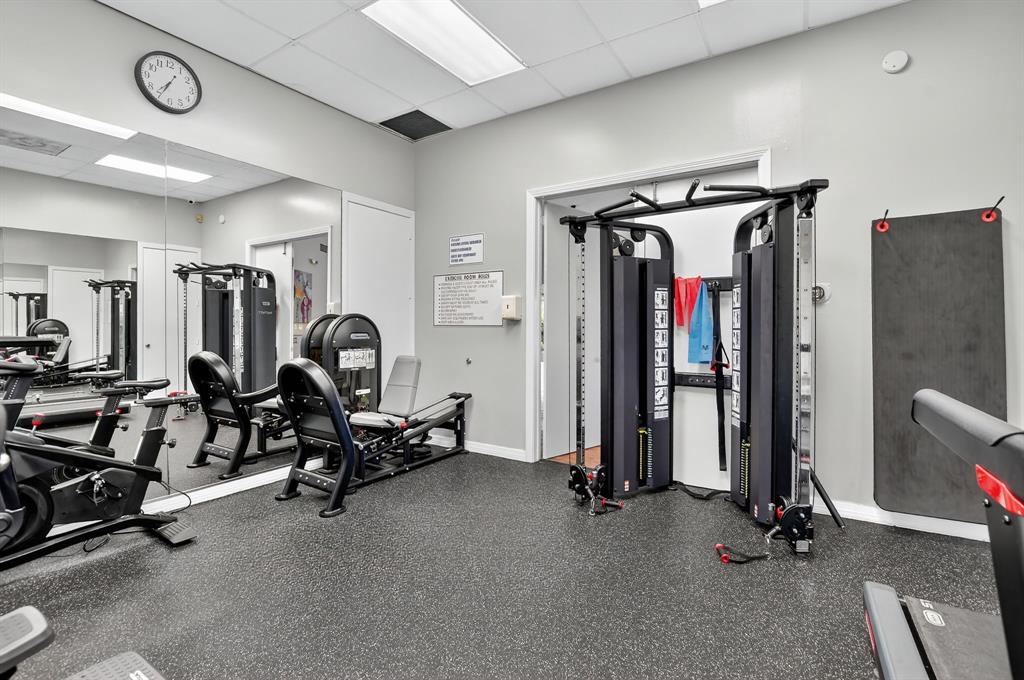 12614 Tiboli Chase Court, Unit 1 Boca Raton, FL 33496 - Photo 58 of 62 a view of a room with gym equipment