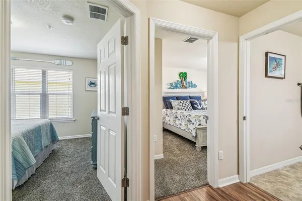 a front view of a residential apartment building with a yard