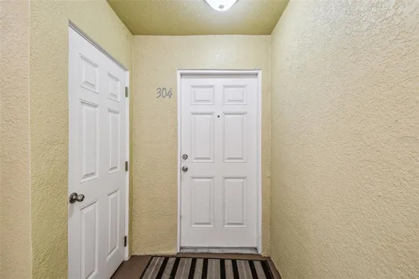 an aerial view of residential houses and outdoor space