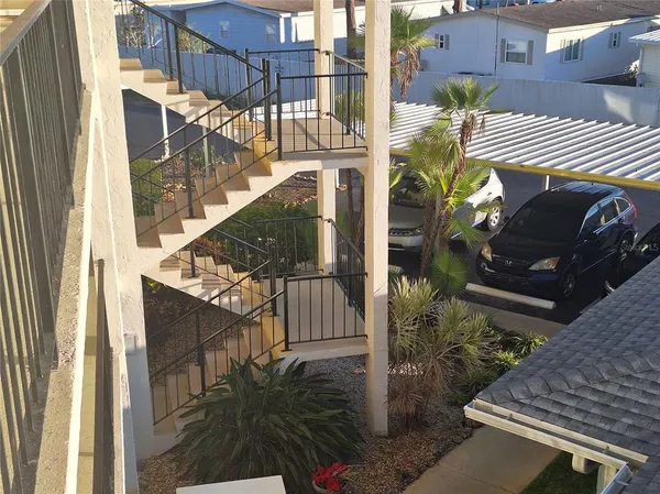 a view of a car park in front of building